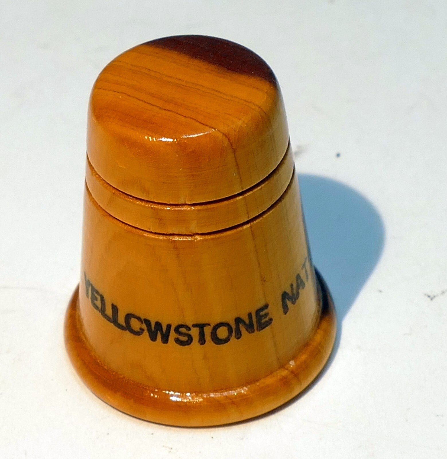 Thimble souvenir yellowstone national park usa wooden