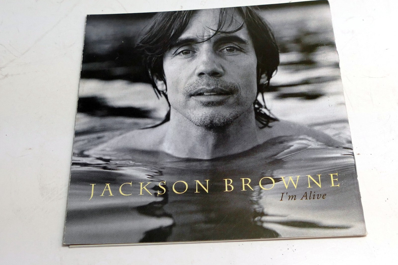 Inlay cover art only no case, cd included   jackson browne i'm alive