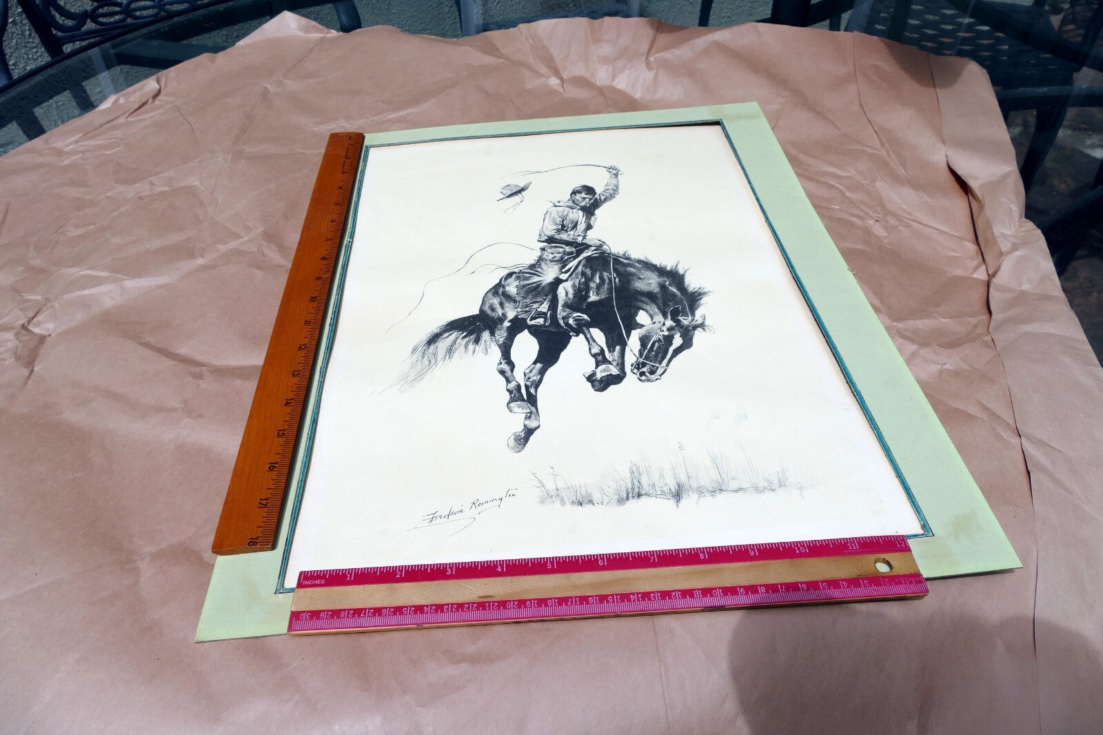 Running Bucker signed Frederic Remington cowboy on a bronco unframed 13X17"