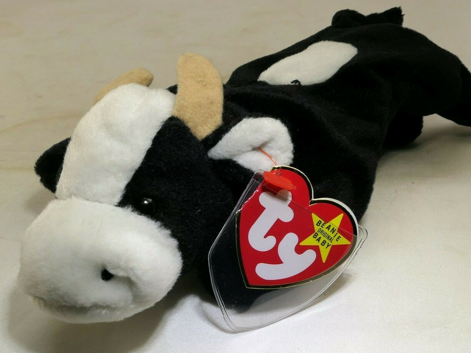 Ty daisy beanie baby tag year 1993 5 10 1994 error plush toy black white cow