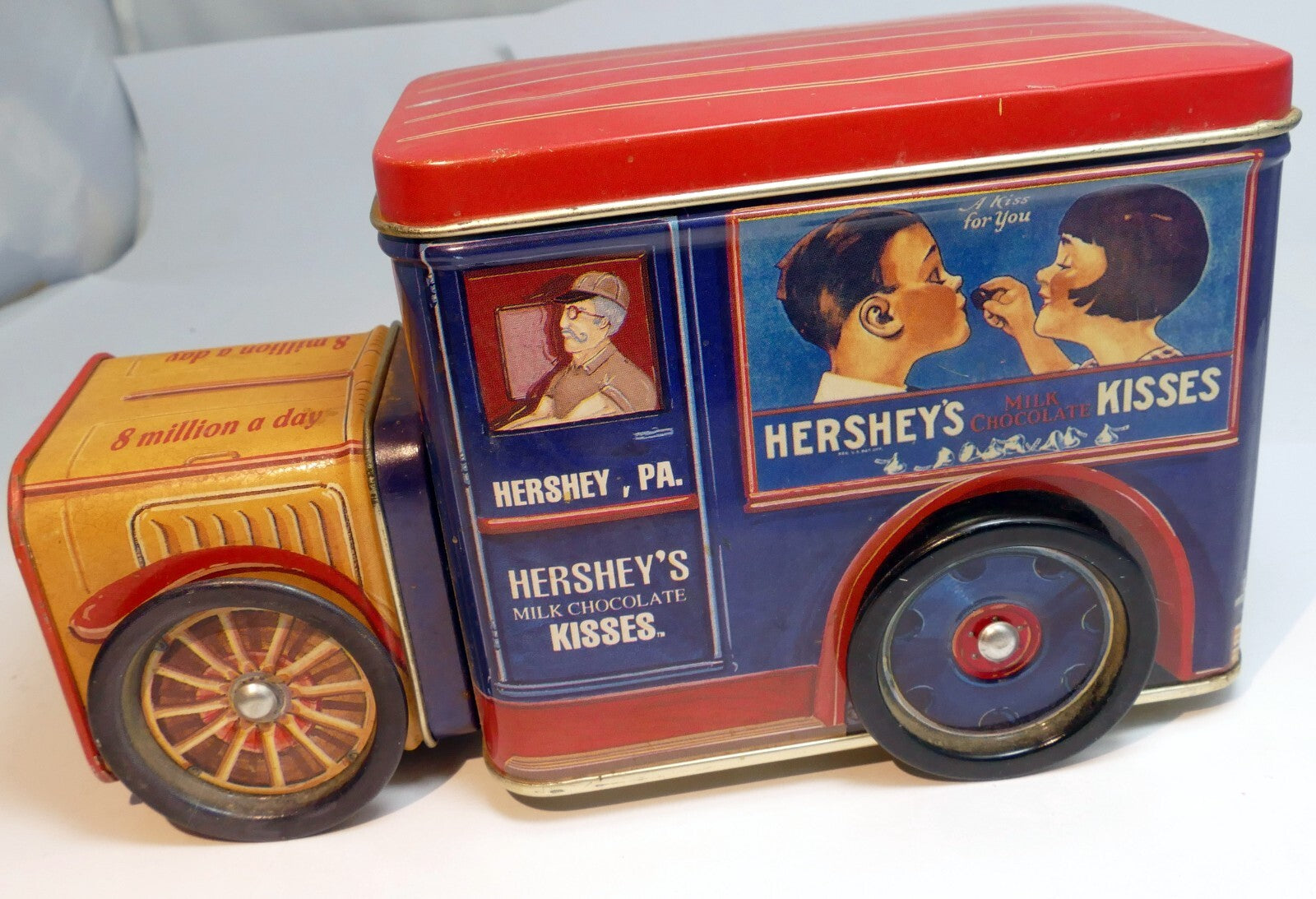 Hershey's chocolate kisses collectible vintage milk truck tin with wheel lid