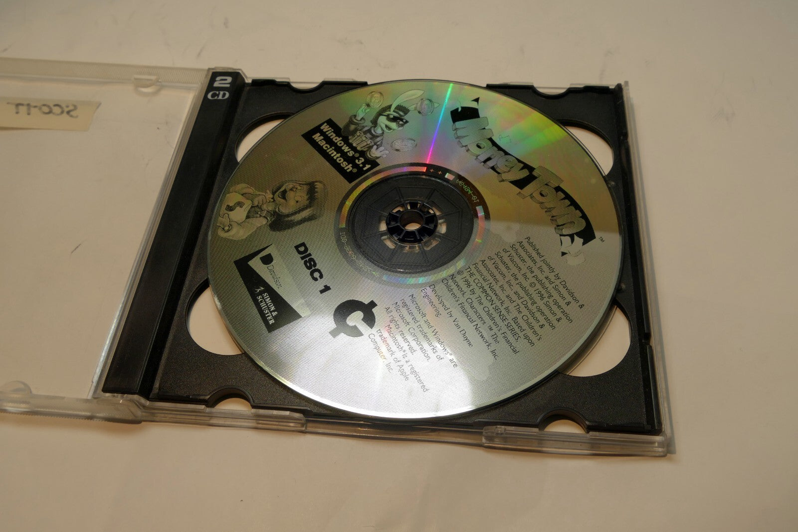 Money Town PC CD Rom Disc 1 & 2 Knowledge adventure Ages 5-9 for Windows 3.1