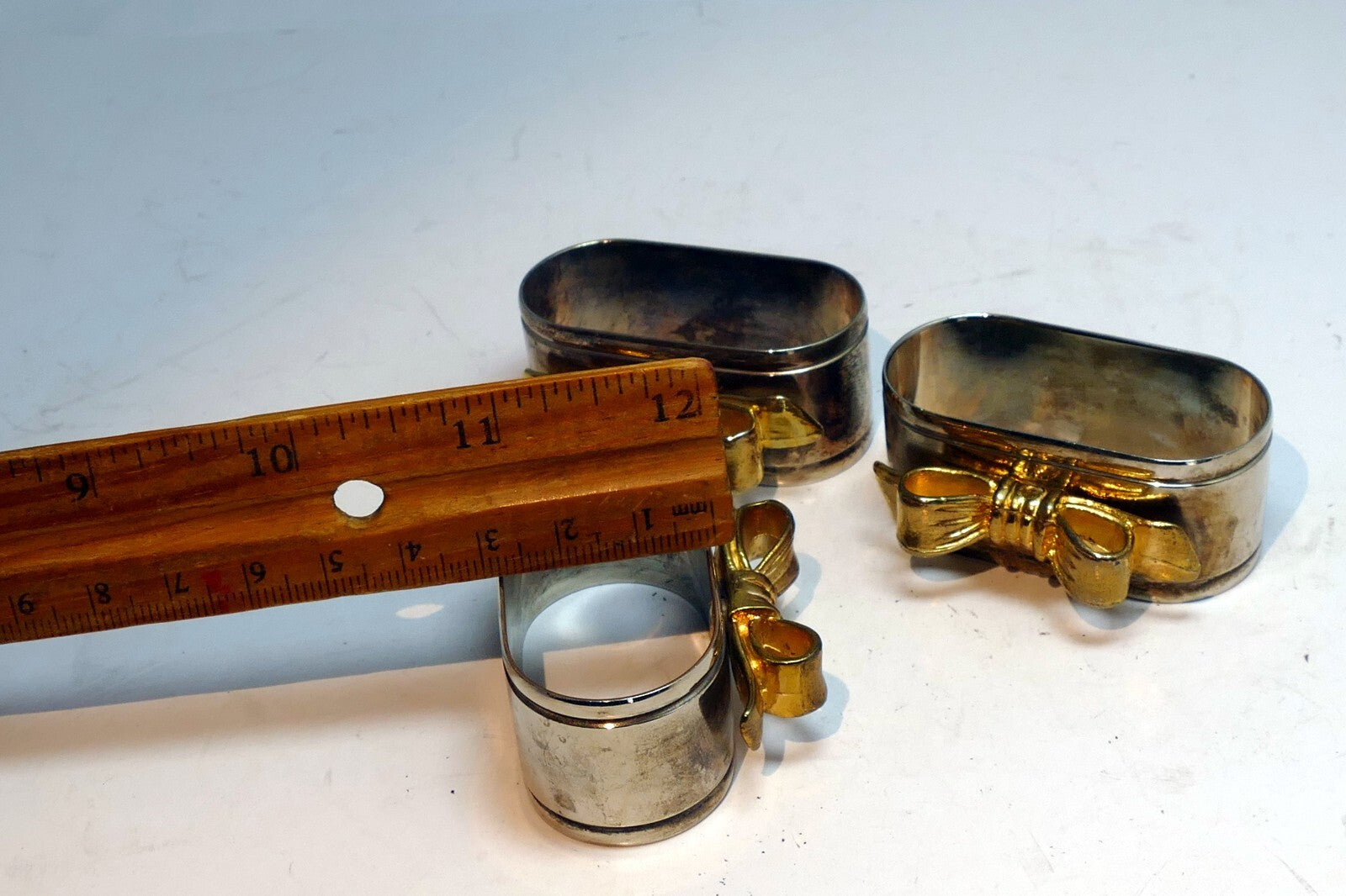 Silver Plated Napkin Rings With Gold Decorative Bow Vintage Lot Of 4 set of four
