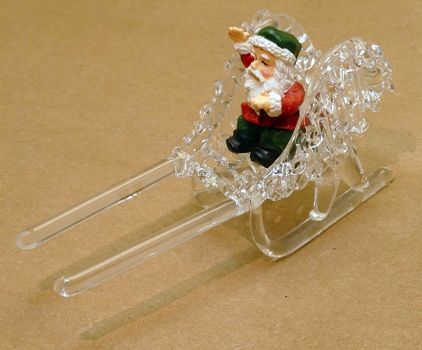 Spun glass crystal christmas ornament sled with santa claus (missing dear)