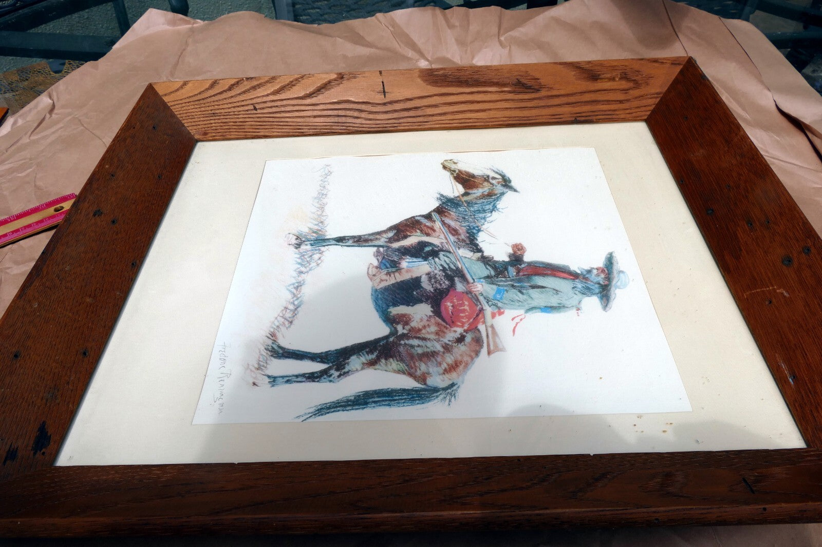 Old Trapper signed Frederic Remington cowboy on a horse framed  11X14"