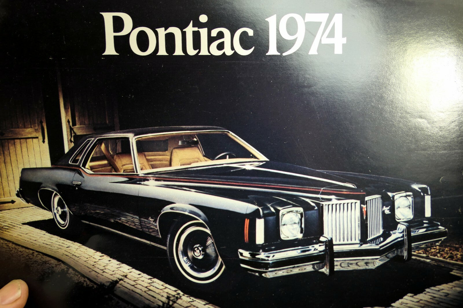 Pontiac 1974 dealership car advertisement ad sales brochure