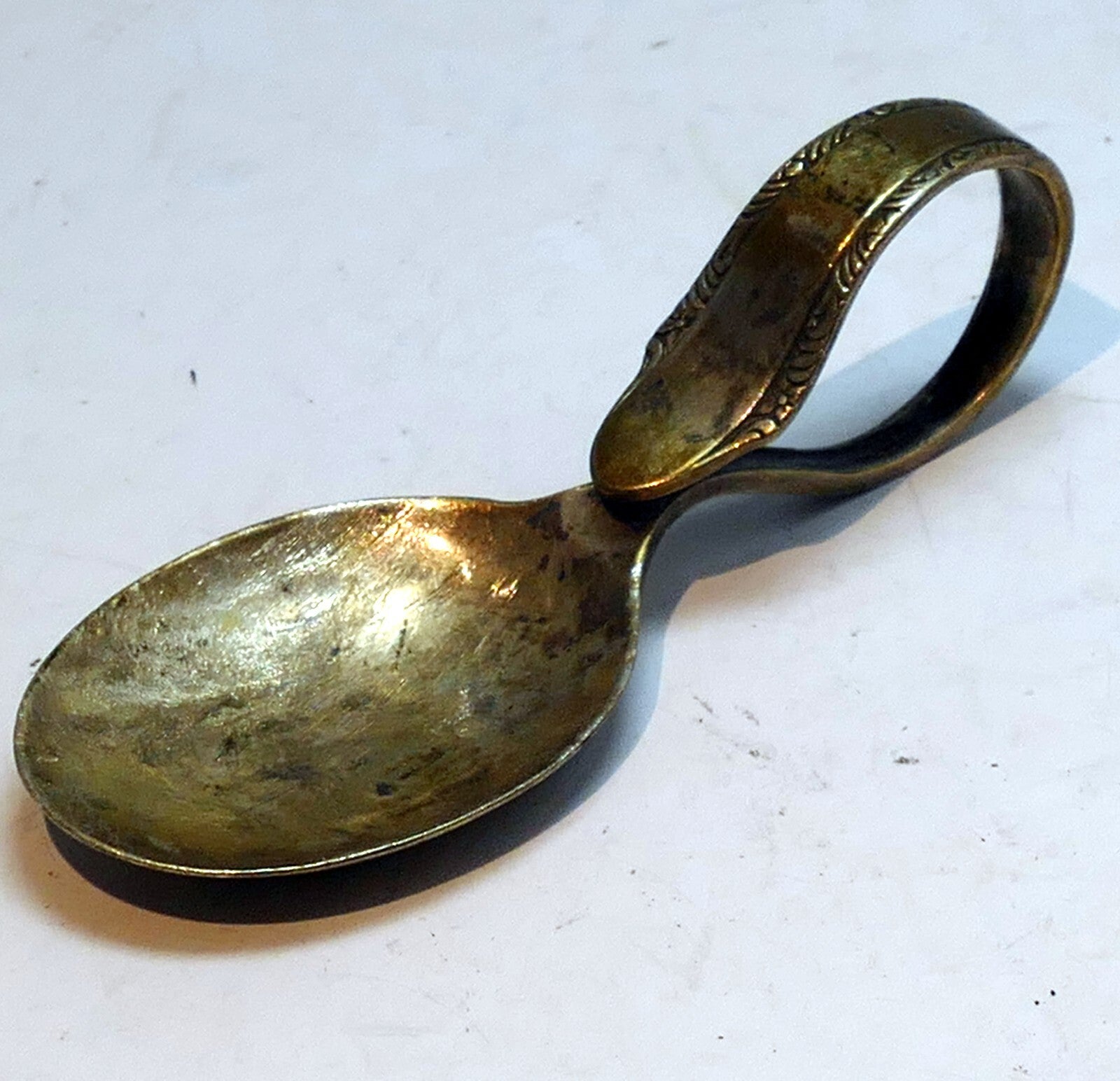 Souvenir looped handle baby or tasting spoon vintage silver plate curved metal