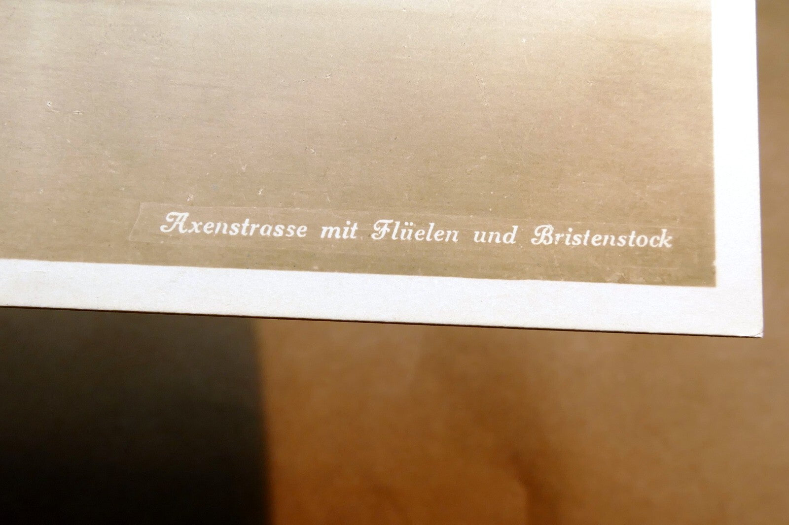 Axenstrasse mit Flüelen und Bristenstock Switzerland  1930's postcard - unposted