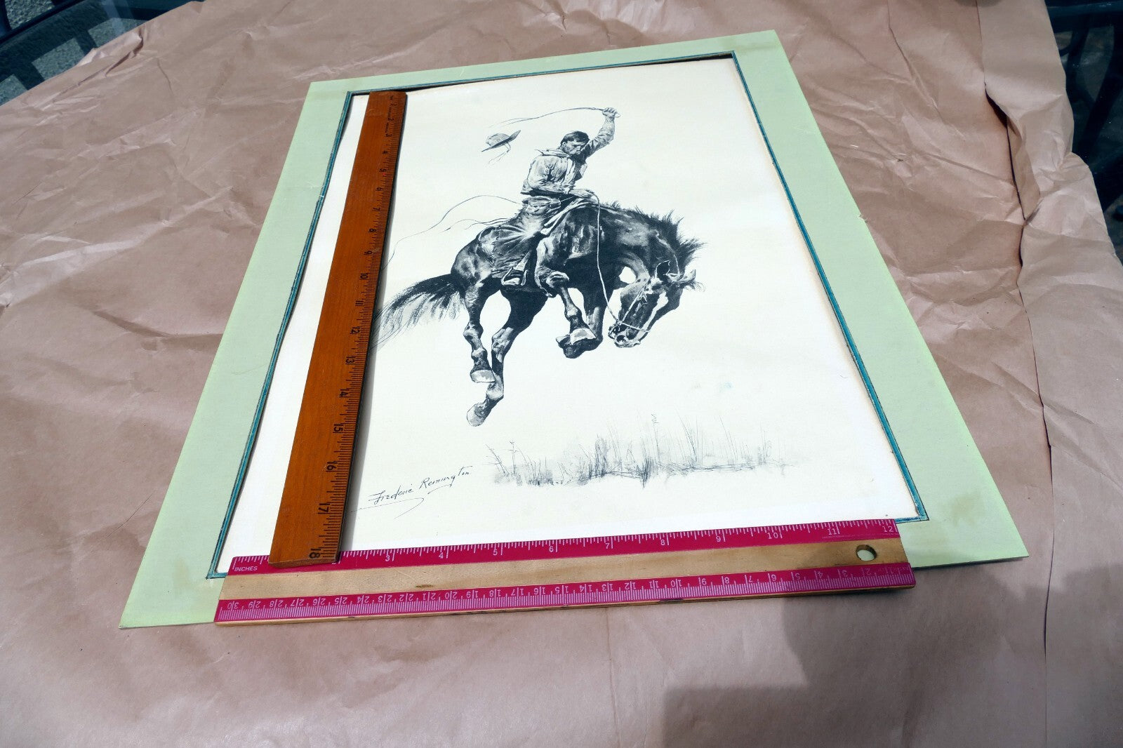 Running Bucker signed Frederic Remington cowboy on a bronco unframed 13X17"