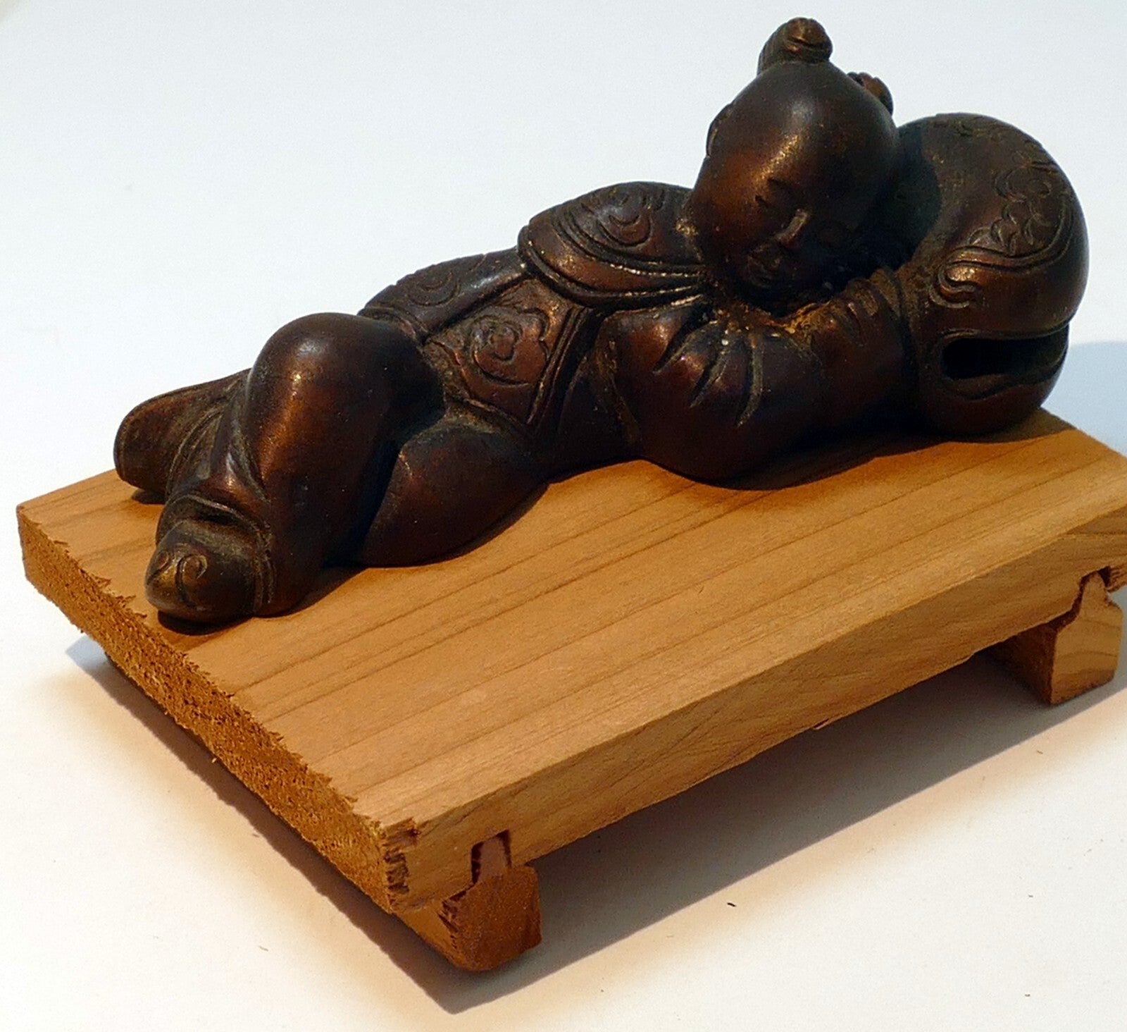 Chinese bronze statue scroll paper weight ming baby w/ horns resting sleeping