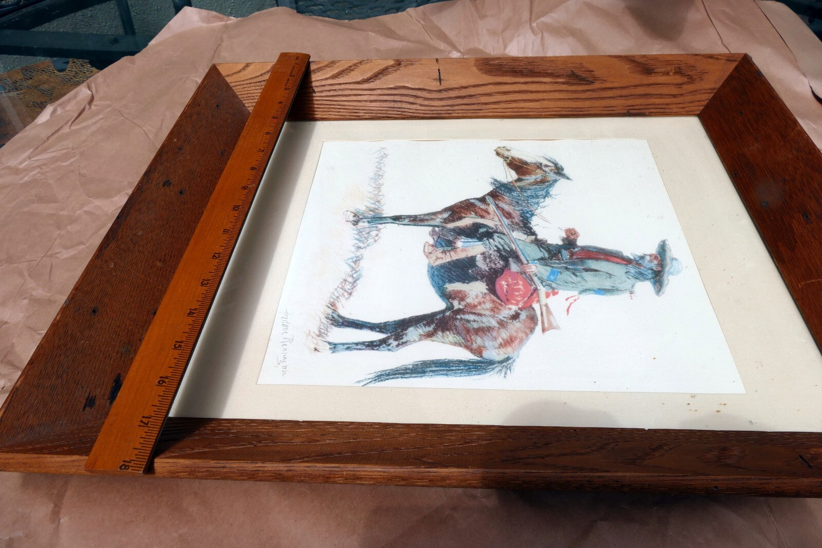 Old Trapper signed Frederic Remington cowboy on a horse framed  11X14"