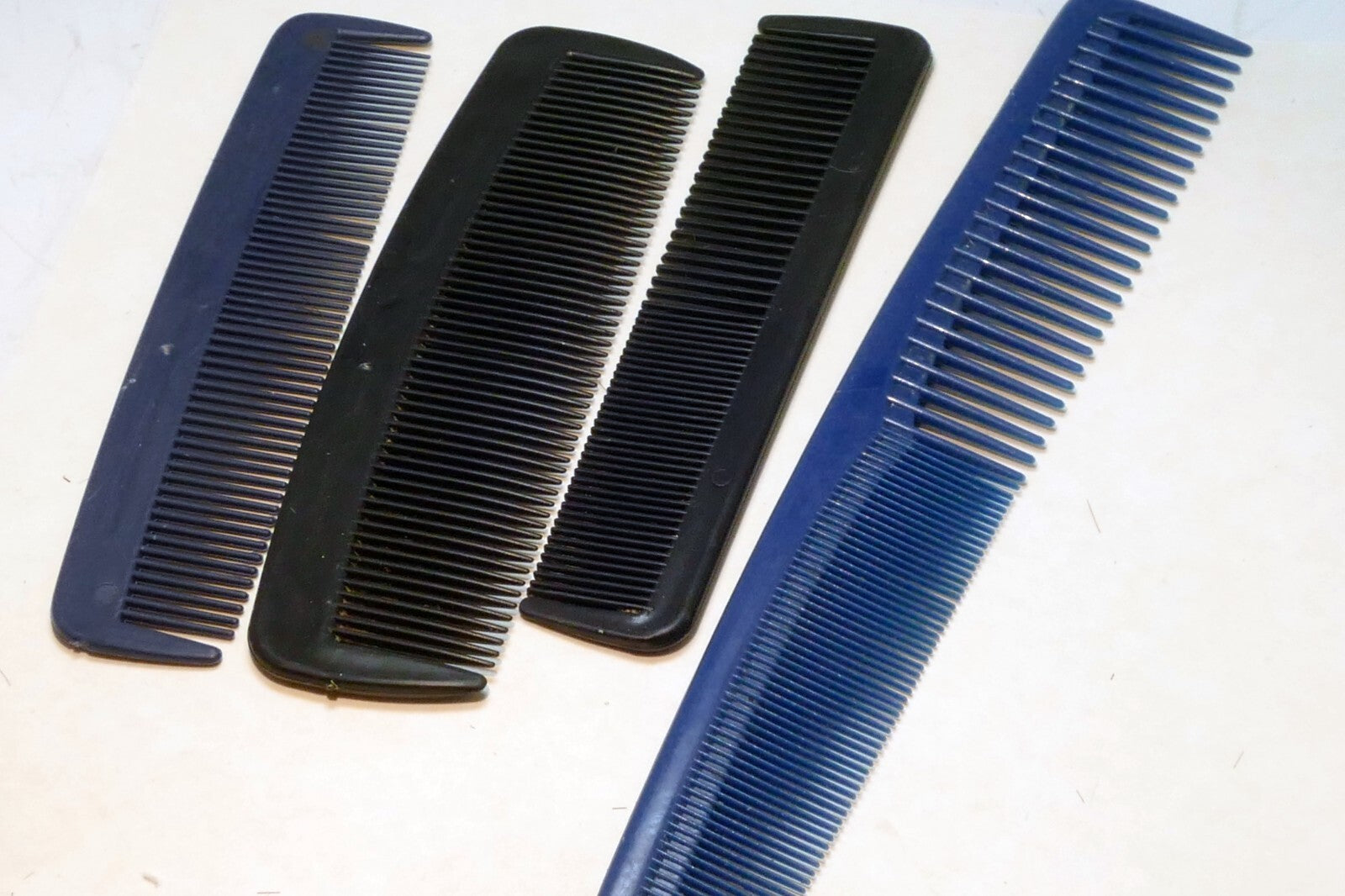 4 pcs black plastic barbershop styling comb set for hair clippers