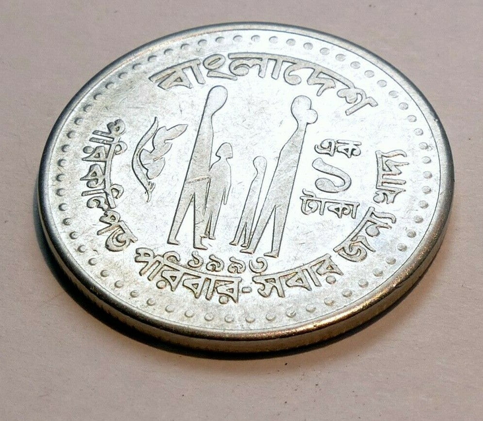 Metal coin asia with family & lotus two adults and two kids