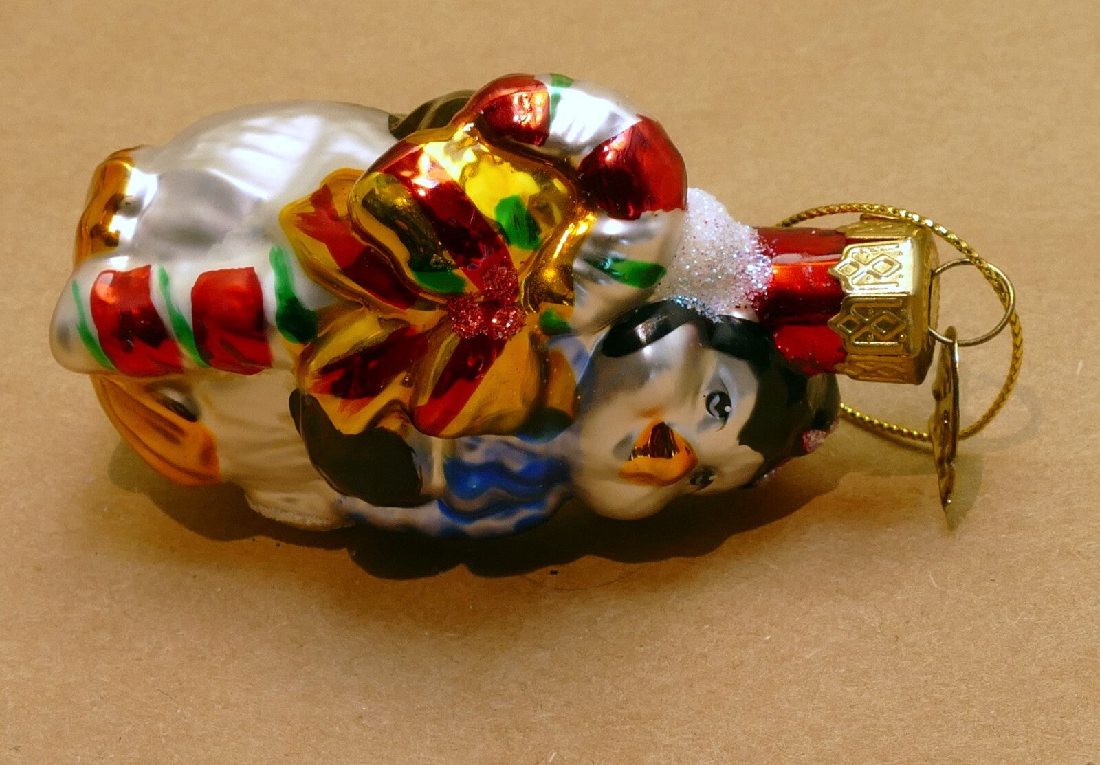 Thomas pacconi glass penguin christmas ornament gold blue w/ a bow