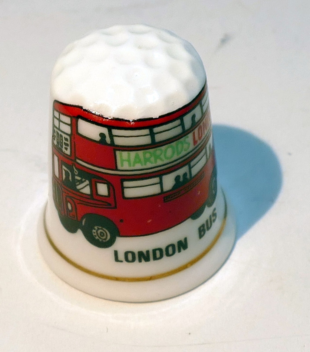 Porcelain thimble souvenir london uk england bus red harrods