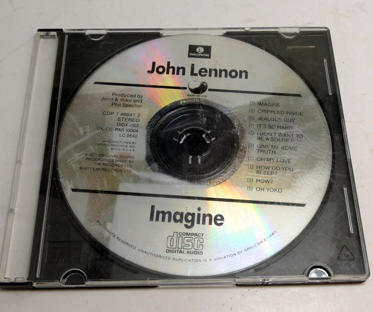 John lennon cd imagine 1971 emi records (music cd only   poor condition )