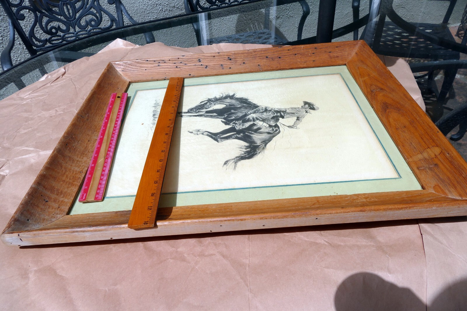 Sunfisher signed Frederic Remington cowboy on a horse framed  13X17"