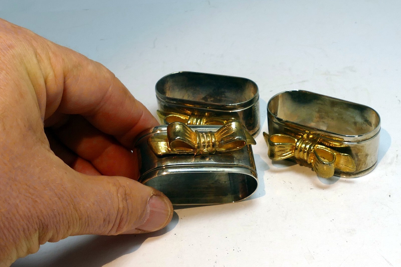 Silver Plated Napkin Rings With Gold Decorative Bow Vintage Lot Of 4 set of four