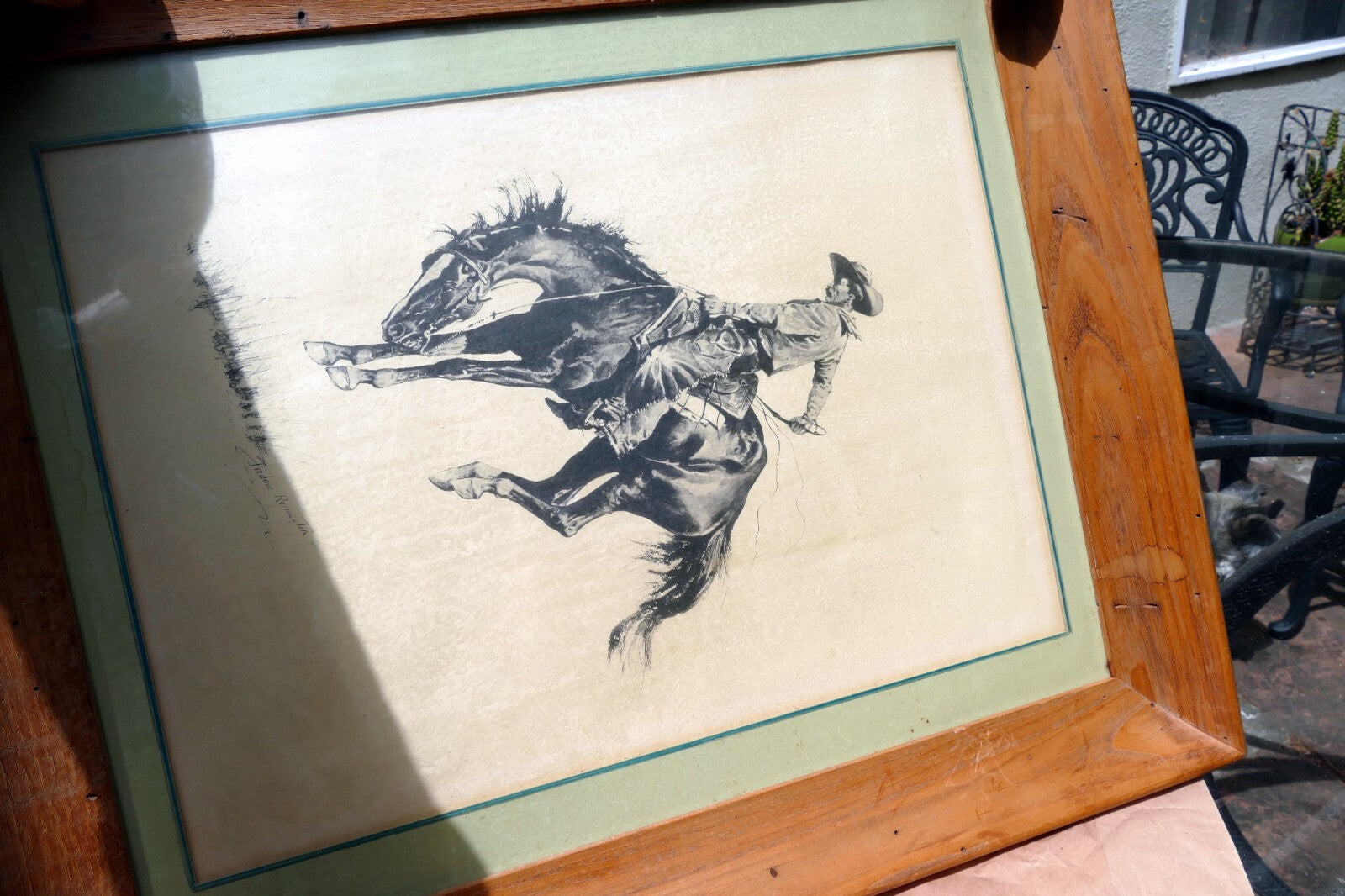 Sunfisher signed Frederic Remington cowboy on a horse framed  13X17"