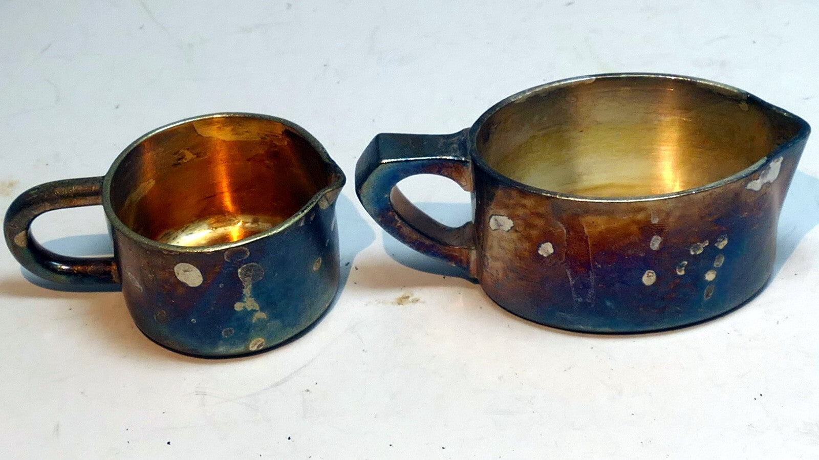 Miniature 2 cm tall metal milk creamer pitcher set of two germany