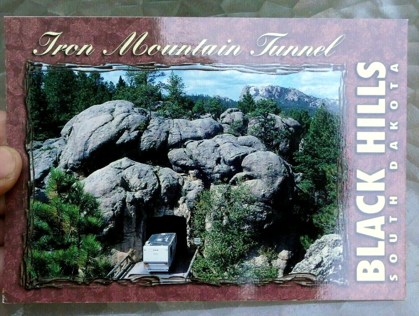 Iron mountain road highway tunnel rock black hills south dakota postcard