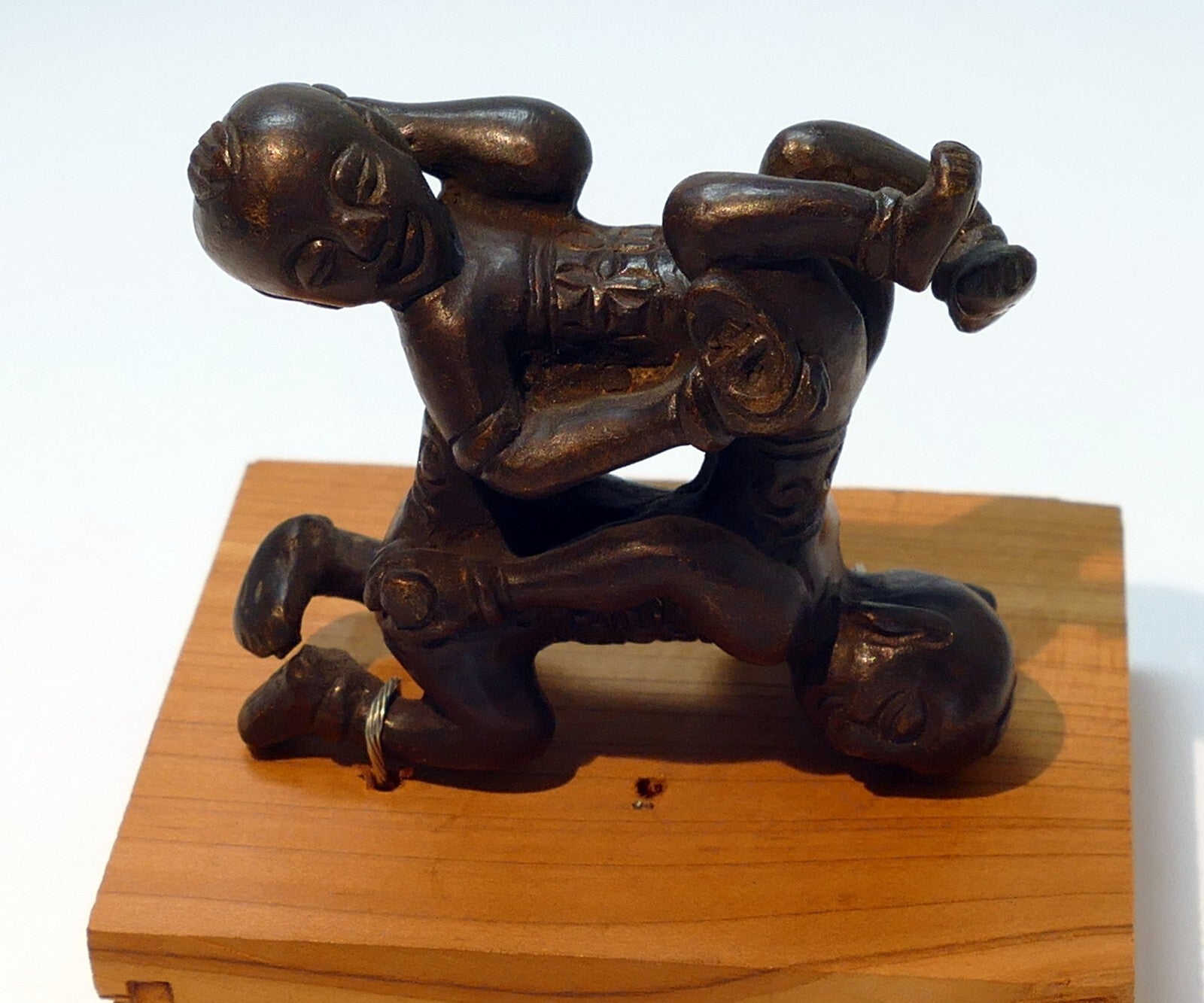 Chinese bronze statue scroll brush rest two children tumbling wrestling ming
