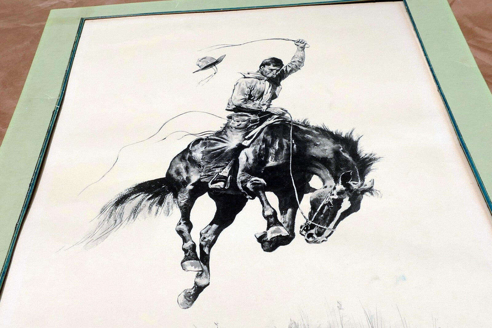 Running Bucker signed Frederic Remington cowboy on a bronco unframed 13X17"