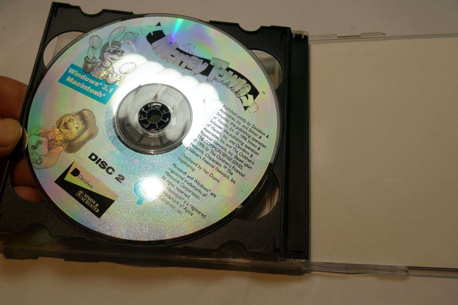 Money Town PC CD Rom Disc 1 & 2 Knowledge adventure Ages 5-9 for Windows 3.1