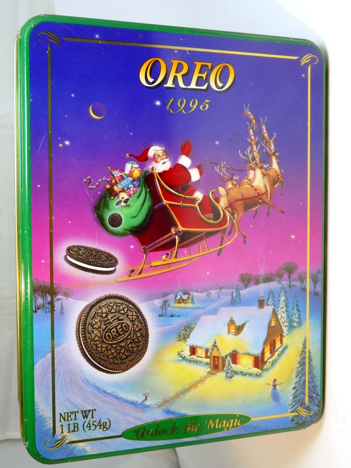 Oreo cookie christmas eve tin empty container flying sled santa claus w/ gifts