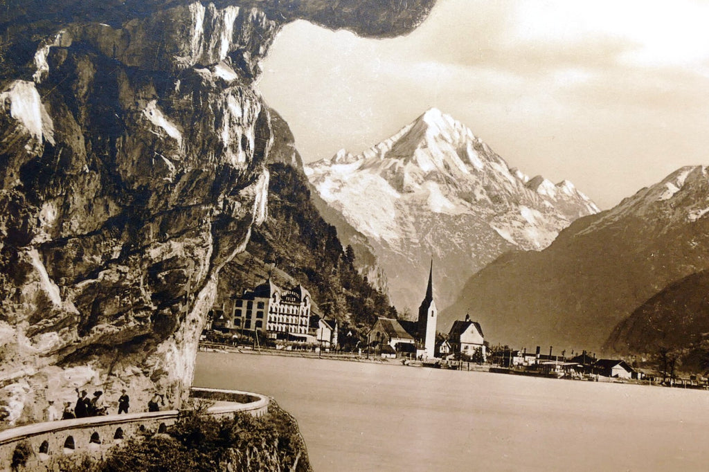 Axenstrasse mit flüelen und bristenstock switzerland 1930's postcard   unposted