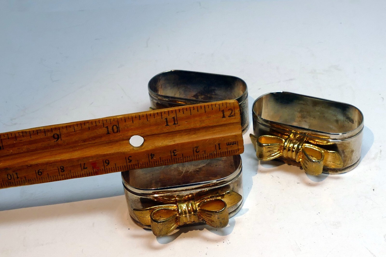 Silver Plated Napkin Rings With Gold Decorative Bow Vintage Lot Of 4 set of four