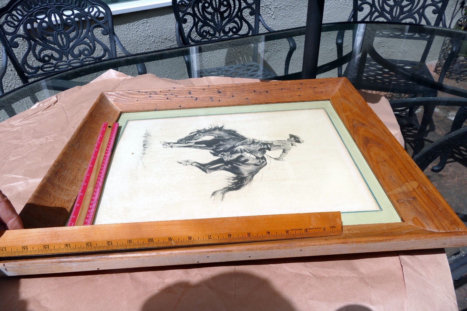 Sunfisher signed Frederic Remington cowboy on a horse framed  13X17"
