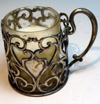 Small metal footed votive candle holder with heart handles floral design 2.5"